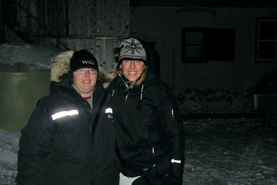 Jill and her roommate Justine outside Seal River Lodge in the evening.