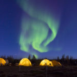 Northern lights over tundra camp at Schmock Lake on the Arctic Safari. Jad Davenport photo.