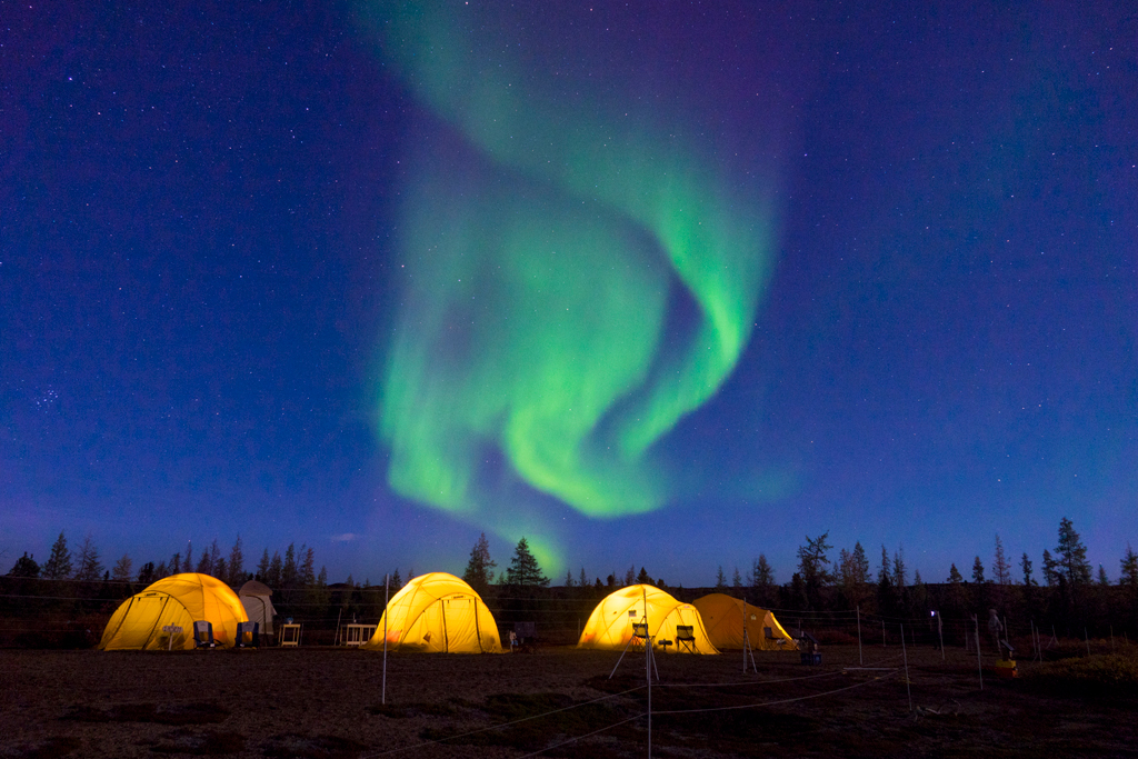 Tundra Camp under northern lights on the Arctic Safari. Jad Davenport photo.
