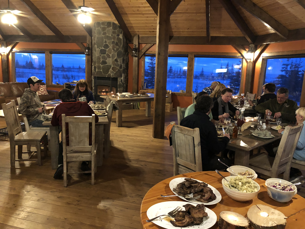 Warming up over dinner in the lodge as dusk falls. 