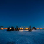 Nanuk Polar Bear Lodge lit up at night.