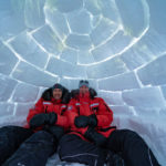 Christoph and Fabienne Jansen in igloo at Nanuk Polar Bear Lodge.