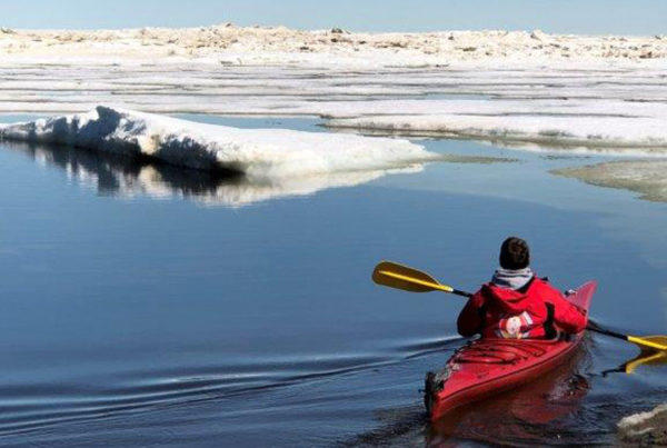 Kayaking around ice in the Hudson Bay.