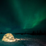 Igloo under northern lights. Nanuk Polar Bear Lodge. Christoph Jansen photo.