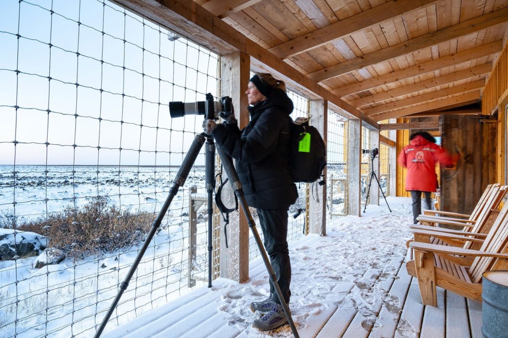 Photographer setting up for the shot. Seal River Heritage Lodge. Scott Zielke photo.