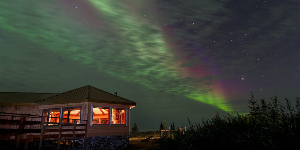 Aurora over Nanuk Polar Bear Lodge. Charles Glatzer photo.