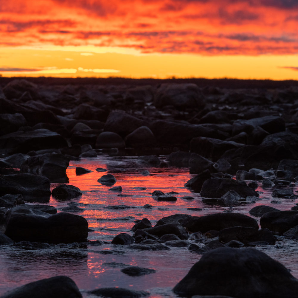 Sunset over the Hudson Bay. Seal River Heritage Lodge. Jason Okazaki photo.