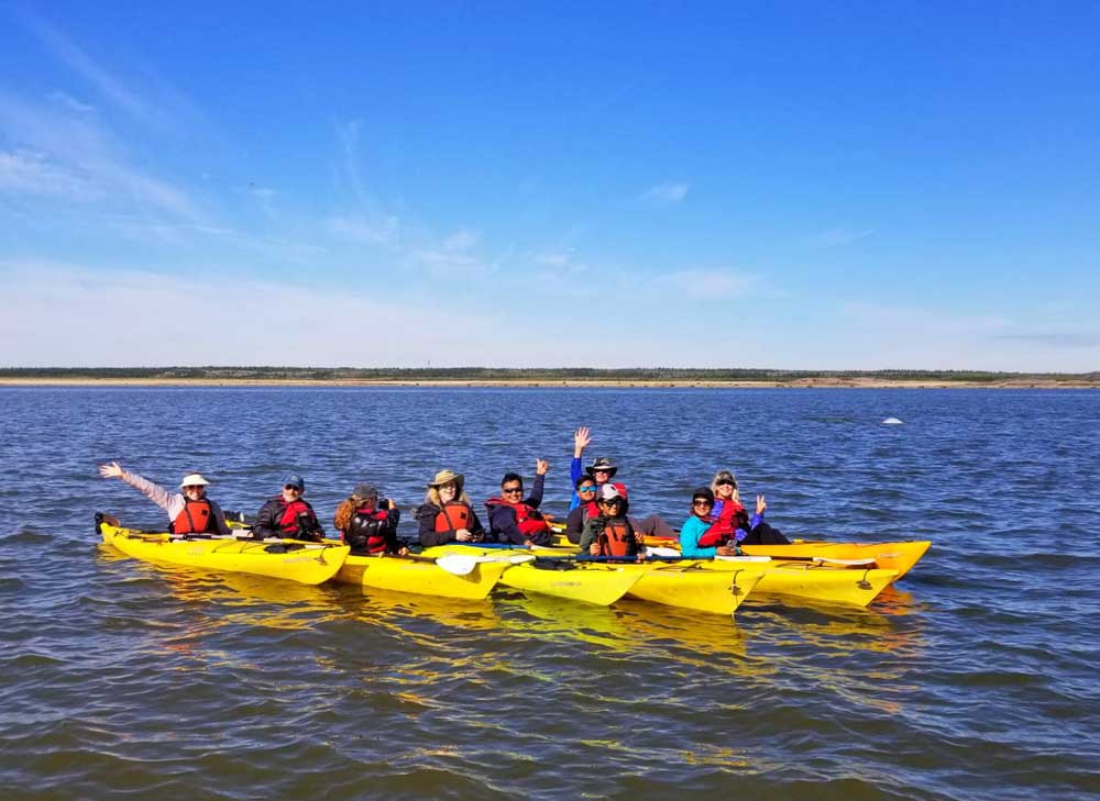 Churchill Wild guests getting ready to kayak with beluga whales on the Arctic Discovery safari. Mary Nicolini photo.