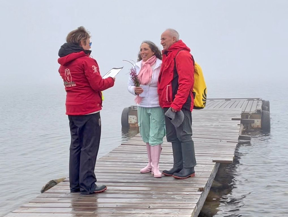 Amy Pink and Fred Lipsky renew their wedding vows on a mist-shrouded dock at Seal River Heritage Lodge. Ceremony performed by Jackie Storry.