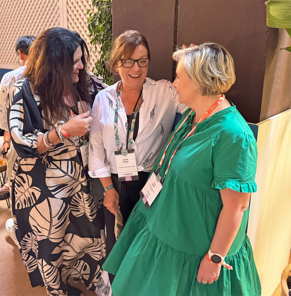 Churchill Wild VP of Business Development Jackie Storry (center) talking to Australian travel operators and friends Donna Phillips (left) and Kylie Gorst at the PURE Life Experiences show.