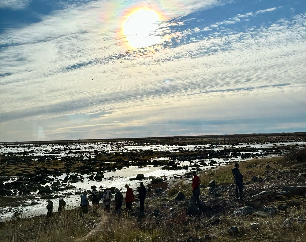 people hiking at Seal River Heritage Lodge