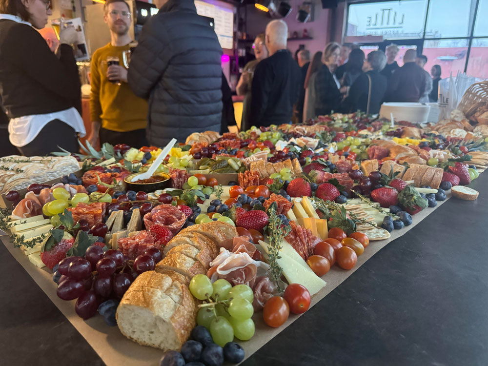 An exquisite selection of cured meats, fine cheeses, fresh fruits, and artisanal breads prepared by local favourite Sharecuterie for Churchill Wild's awareness event at The Little Brown Jug.