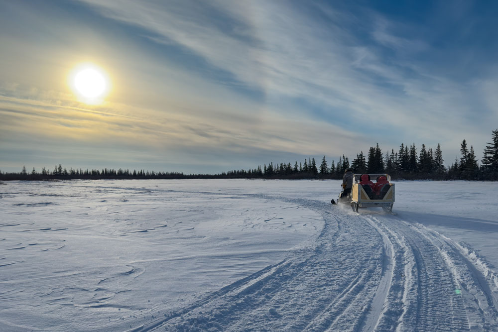 Searching for polar bears at sunrise. Nanuk Polar Bear Lodge. Christoph Jansen / ArcticWild.net photo.