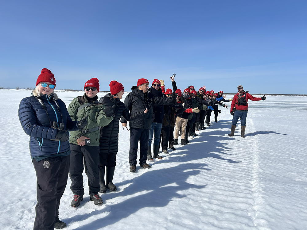 RVC group out for a hike at Seal River Heritage Lodge.