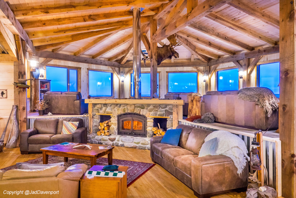 Beautiful new stone fireplace in the timber frame lounge at Seal River Heritage Lodge. Jad Davenport photo.