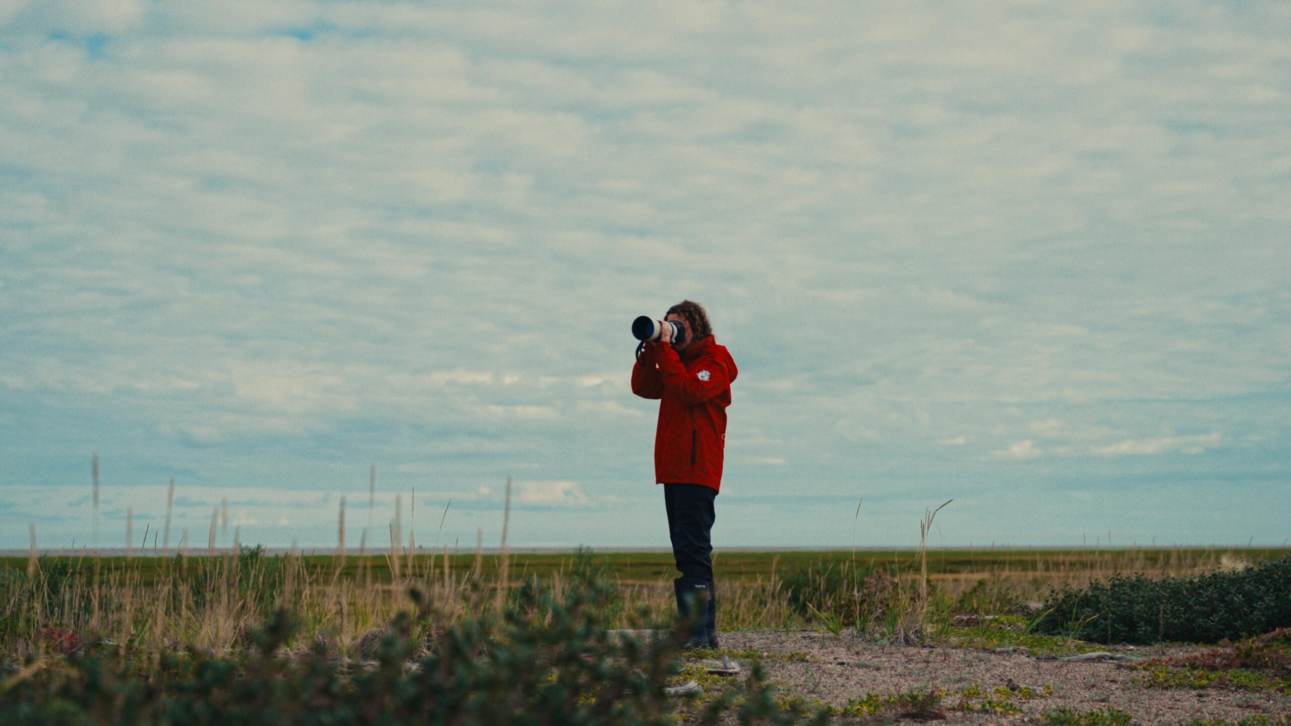 Priscilla Downey photographing the landscape at Nanuk Polar Bear Lodge.