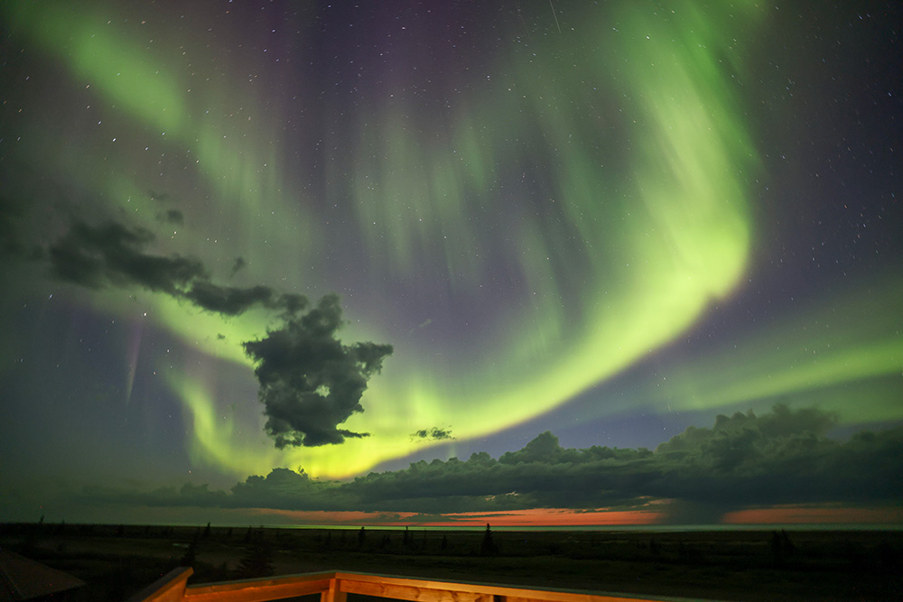 Northern lights over Nanuk Polar Bear Lodge. Priscilla Downey photo.
