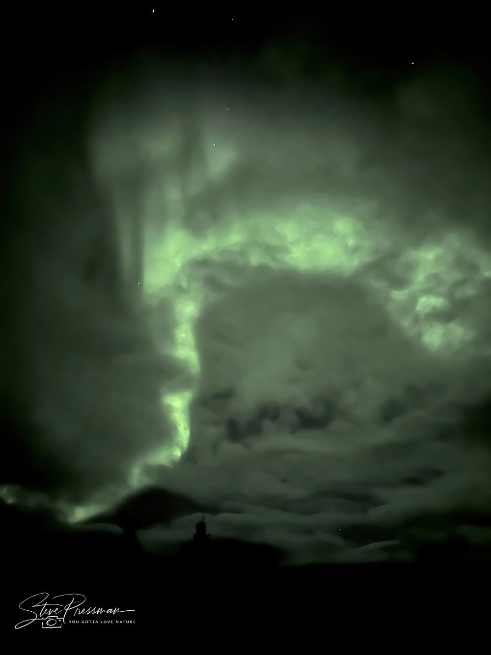 Northern lights hiding under the clouds. Steve Pressman / YouGottaLoveNature.com photo.