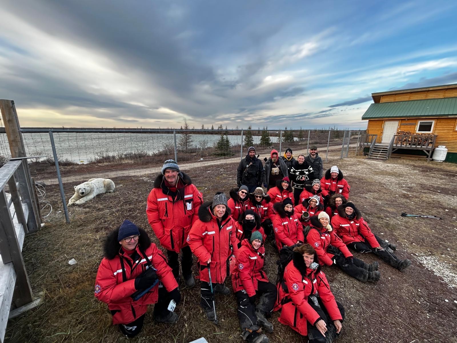 Memories were made at Dymond Lake Ecolodge on the Great Ice Bear. Even for Scarbrow, the semi-resident polar bear seer resting in the background. Nolan Plew photo.