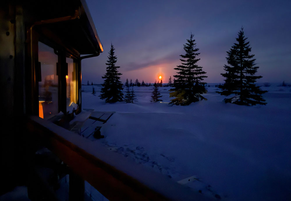 Moonset at Churchill Wild's Nanuk Polar Bear Lodge. Cloud Wolves of the Kaska Coast safari. March 2026. Ellen Zangla photo.