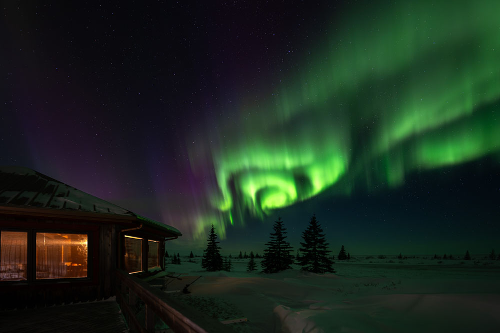 Northern lights at Nanuk Polar Bear Lodge. Fabienne Jansen / ArcticWild.net photo.
