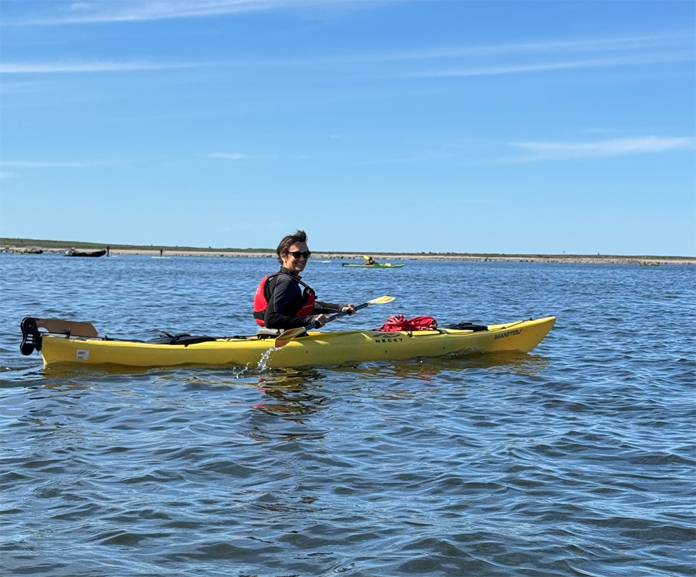 Carolyn heading out to kayak with the beluga whales in Churchill.
