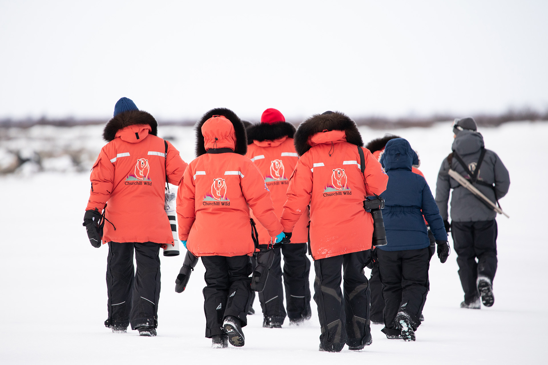 Guests walking in snow. Seal River Lodge. Jennie Lisacek photo.